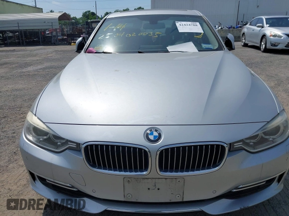 2013 BMW 3 Series 335i xDrive with VIN WBA3B9G57DNP39692, listed as a IAAI auction lot 42424788 with Not provided miles and . Bid and sale history available at DreamBid. Image 10.