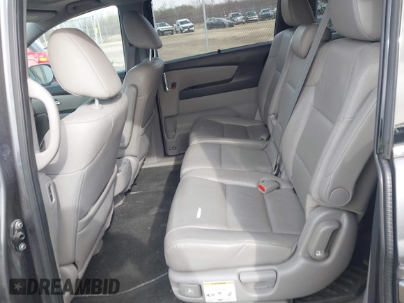 2016 Honda Odyssey Touring Elite z VIN 5FNRL5H99GB072860, wystawiony jako IAAI lot #42157603 z przebiegiem 221 449 mil mil oraz . Historia ofert i sprzedaży dostępna na DreamBid. Obrazek 8.