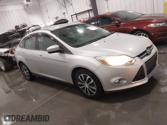 2012 Ford Focus SE with VIN 1FAHP3F24CL217049, listed as a IAAI auction lot 41825450 with 86,573 mi miles. Bid and sale history available at carsss.com. Image 1.