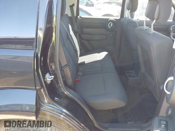 2011 Dodge Nitro Heat with VIN 1D4PU4GX7BW565927, listed as a IAAI auction lot 41803129 with 84,980 mi miles. Bid and sale history available at carsss.com. Image 8.