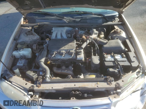 1999 Toyota Camry LE z VIN JT2BF22K4X0199123, wystawiony jako Copart lot #53456665 z przebiegiem 181 526 mil mil oraz Szkoda całkowita • Salvage title. Historia ofert i sprzedaży dostępna na DreamBid. Obrazek 11.