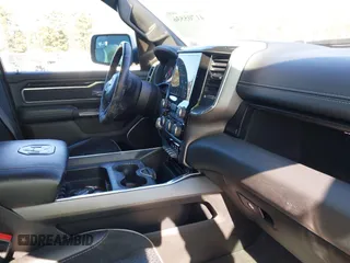 2022 Ram 1500 Laramie with VIN 1C6SRFJTXNN237199, listed as a IAAI auction lot 41705536 with 35,143 mi miles and . Bid and sale history available at DreamBid. Image 5.