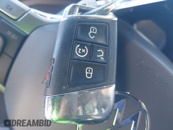 2022 Volkswagen Atlas SEL Premium R-Line with VIN 1V2FE2CA4NC218765, listed as a IAAI auction lot 41103593 with 42,008 mi miles and . Bid and sale history available at DreamBid. Image 11.