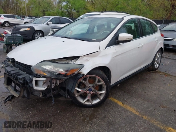 2012 Ford Focus Titanium with VIN 1FAHP3N29CL415935, listed as a IAAI auction lot 42004275 with 227,262 mi miles and . Bid and sale history available at carsss.com. Image 2.