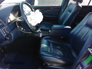 1996 Mercedes-Benz C with VIN WDBHA28E5TF406948, listed as a Copart auction lot 80234944 with 239,256 mi miles and Salvage Title. Bid and sale history available at carsss.com. Image 7.