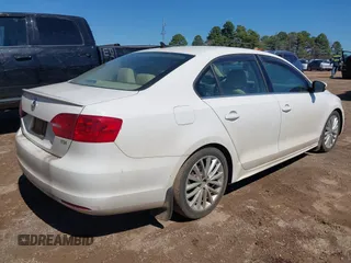 2013 Volkswagen Jetta TDI w/Premium with VIN 3VW3L7AJ4DM361445, listed as a IAAI auction lot 41735571 with 133,894 mi miles and . Bid and sale history available at DreamBid. Image 4.