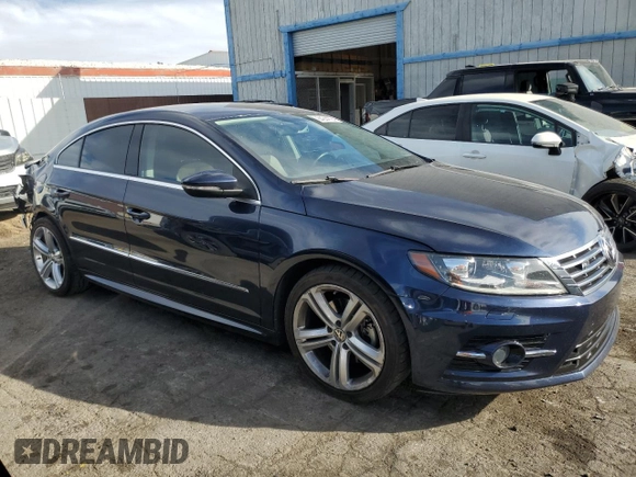 2014 Volkswagen CC R-Line with VIN WVWBP7AN7EE506748, listed as a Copart auction lot 84244724 with 99,272 mi miles and Salvage Title. Bid and sale history available at carsss.com. Image 4.
