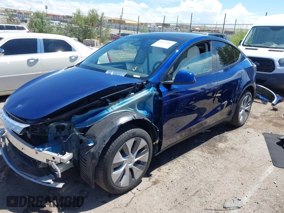2024 Tesla Model Y Long Range with VIN 7SAYGDEE6RA242980, listed as a IAAI auction lot 40121685 with 9,126 mi miles and . Bid and sale history available at DreamBid. Image 2.