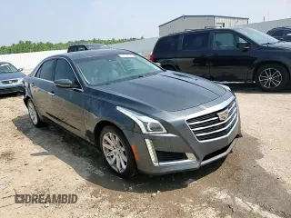 2015 Cadillac CTS Luxury RWD z VIN 1G6AR5SX2F0118726, wystawiony jako Copart lot #59198185 z przebiegiem 106 604 mil mil oraz Szkoda całkowita • Salvage title. Historia ofert i sprzedaży dostępna na DreamBid. Obrazek 13.