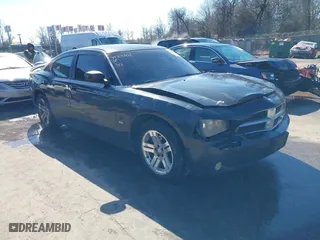 2006 Dodge Charger with VIN 2B3KA43G56H533229, listed as a IAAI auction lot 41702507 with 220,511 mi miles. Bid and sale history available at carsss.com. Image 1.