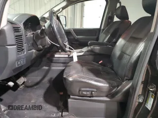 2013 Nissan Titan Pro-4X с VIN 1N6AA0EC1DN301354, выставлен на аукционе Copart как лот 45233045 с пробегом 172 450 миль миль и Списание • Salvage title. История ставок и продаж доступна на DreamBid. Изображение 7.