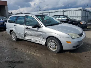 2005 Ford Focus SE z VIN 1FAHP36N95W317739, wystawiony jako Copart lot #45311395 z przebiegiem 192 354 mil mil oraz Szkody całkowita. Historia ofert i sprzedaży dostępna na DreamBid. Obrazek 4.