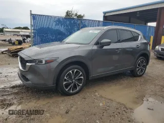 2022 Mazda CX-5 2.5 S Premium Package with VIN JM3KFBDM9N0635877, listed as a Copart auction lot 72592474 with 14,242 mi miles and Salvage Title. Bid and sale history available at carsss.com. Image 1.
