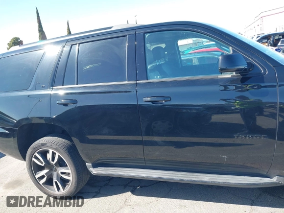 2019 Chevrolet Tahoe LT with VIN 1GNSCBKC4KR114608, listed as a IAAI auction lot 41954543 with 64,007 mi miles and . Bid and sale history available at DreamBid. Image 14.