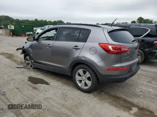 2012 Kia Sportage LX z VIN KNDPB3A20C7217165, wystawiony jako Copart lot #60999525 z przebiegiem 128 231 mil mil oraz Szkoda całkowita • Salvage title. Historia ofert i sprzedaży dostępna na DreamBid. Obrazek 2.