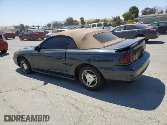 1998 Ford Mustang with VIN 1FAFP4447WF156297, listed as a Copart auction lot 60757265 with 61,296 mi miles and Salvage title. Bid and sale history available at DreamBid. Image 2.
