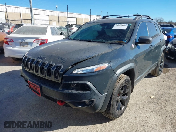 2017 Jeep Cherokee Trailhawk L Plus with VIN 1C4PJMBBXHW634944, listed as a IAAI auction lot 41022673 with 116,542 mi miles. Bid and sale history available at carsss.com. Image 18.