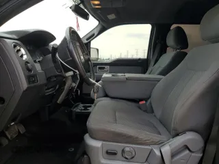 2011 Ford F-150 XLT with VIN 1FTFW1ET4BFC98666, listed as a Copart auction lot 59034455 with 175,742 mi miles and Salvage title. Bid and sale history available at DreamBid. Image 7.