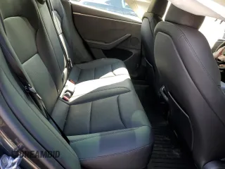 2025 Tesla Model 3 Long Range with VIN 5YJ3E1EB6SF921092, listed as a Copart auction lot 46918025 with 1,403 mi miles and Salvage Title. Bid and sale history available at DreamBid. Image 10.