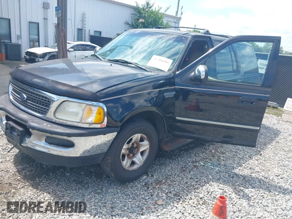 1998 Ford Expedition XLT with VIN 1FMRU176XWLB30950, listed as a IAAI auction lot 42704595 with 303,838 mi miles and . Bid and sale history available at DreamBid. Image 2.