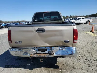 1999 Ford F-150 XL with VIN 1FTRX18LXXNA59898, listed as a Copart auction lot 49326055 with 0 mi miles and Salvage Title. Bid and sale history available at carsss.com. Image 6.