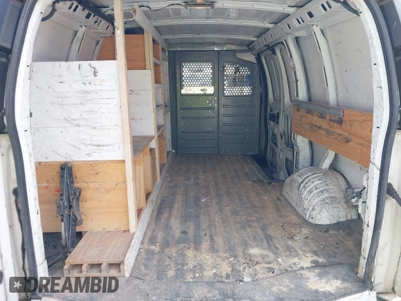 2012 Chevrolet Express Cargo with VIN 1GCWGFFA8C1106882, listed as a IAAI auction lot 42284350 with 227,443 mi miles and . Bid and sale history available at DreamBid. Image 17.