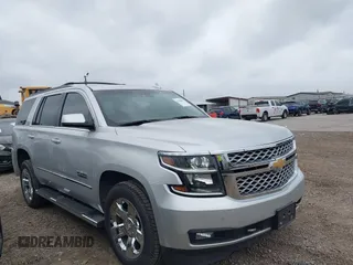 2019 Chevrolet Tahoe LT z VIN 1GNSCBKC1KR191789, wystawiony jako IAAI lot #42144961 z przebiegiem 94 178 mil mil oraz . Historia ofert i sprzedaży dostępna na DreamBid. Obrazek 13.