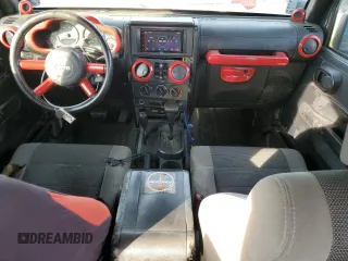 2007 Jeep Wrangler Unlimited X with VIN 1J4GA391X7L171902, listed as a Copart auction lot 82150334 with 167,695 mi miles and Salvage title. Bid and sale history available at DreamBid. Image 8.