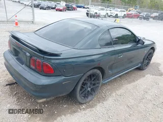 1998 Ford Mustang GT with VIN 1FAFP42X0WF234934, listed as a IAAI auction lot 41789646 with 250,864 mi miles and . Bid and sale history available at DreamBid. Image 4.