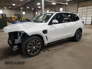 2023 BMW X5 xDrive45e z VIN 5UXTA6C07P9N71269, wystawiony jako Copart lot #55241825 z przebiegiem 24 836 mil mil oraz Nie do naprawy • Non repairable. Historia ofert i sprzedaży dostępna na DreamBid. Obrazek 1.
