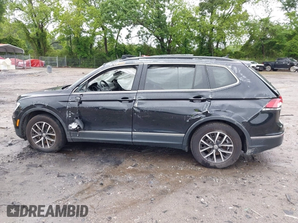 2021 Volkswagen Tiguan SE with VIN 3VV3B7AX6MM021502, listed as a IAAI auction lot 42243705 with 60,988 mi miles and . Bid and sale history available at DreamBid. Image 13.