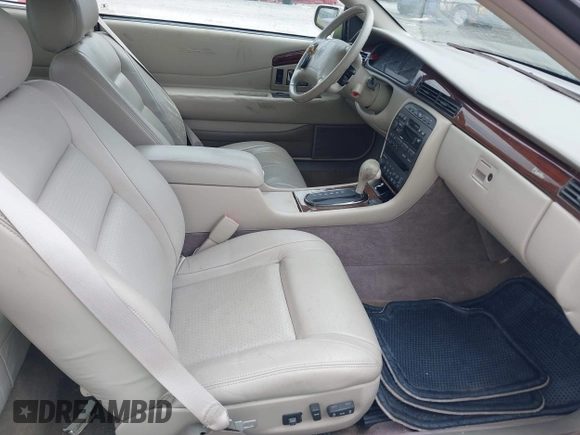 1997 Cadillac Eldorado Touring with VIN 1G6ET1293VU604921, listed as a IAAI auction lot 42113040 with 57,029 mi miles and . Bid and sale history available at DreamBid. Image 5.