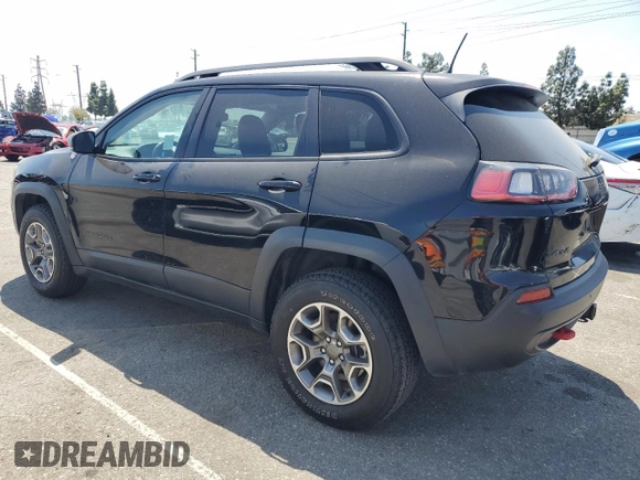 2021 Jeep Cherokee Trailhawk with VIN 1C4PJMBX8MD167153, listed as a Copart auction lot 54929845 with 52,800 mi miles and Clean title. Bid and sale history available at DreamBid. Image 2.