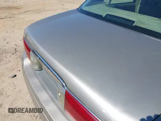 2003 Buick LeSabre Custom with VIN 1G4HP52K53U103689, listed as a IAAI auction lot 41831564 with 211,663 mi miles. Bid and sale history available at carsss.com. Image 12.