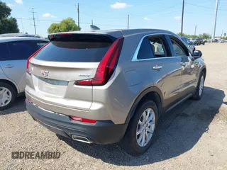 2023 Cadillac XT4 FWD Luxury with VIN 1GYAZAR4XPF116698, listed as a IAAI auction lot 40594015 with 18,368 mi miles. Bid and sale history available at carsss.com. Image 4.