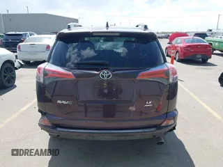 2017 Toyota RAV4 LE with VIN 2T3BFREV4HW580568, listed as a IAAI auction lot 42100704 with 157,300 mi miles and . Bid and sale history available at DreamBid. Image 16.