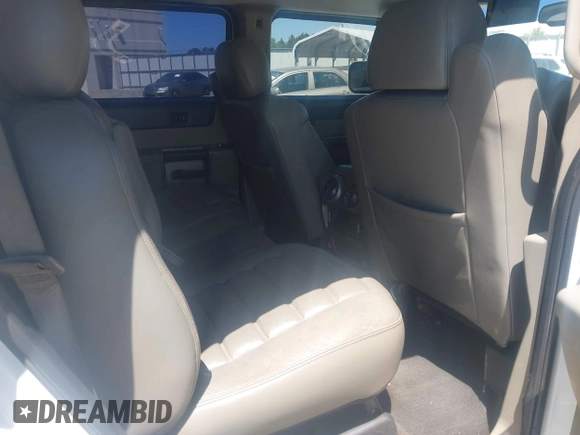 2003 Hummer H2 z VIN 5GRGN23U53H102215, wystawiony jako IAAI lot #42054023 z przebiegiem 222 170 mil mil oraz . Historia ofert i sprzedaży dostępna na DreamBid. Obrazek 8.