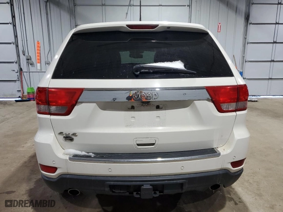 2012 Jeep Grand Cherokee Overland with VIN 1C4RJFCT5CC185100, listed as a Copart auction lot 42745615 with 126,696 mi miles and Salvage Title. Bid and sale history available at carsss.com. Image 6.