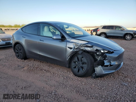 2024 Tesla Model Y Long Range z VIN 7SAYGAEEXRF211507, wystawiony jako Copart lot #56432715 z przebiegiem Nie podano mil oraz Szkoda całkowita • Salvage title. Historia ofert i sprzedaży dostępna na DreamBid. Obrazek 4.