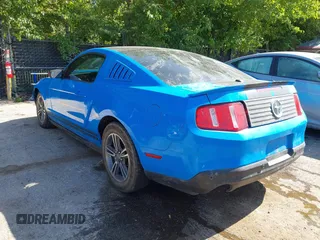 2012 Ford Mustang Premium with VIN 1ZVBP8AM2C5257752, listed as a IAAI auction lot 42817735 with 128,015 mi miles and . Bid and sale history available at DreamBid. Image 3.