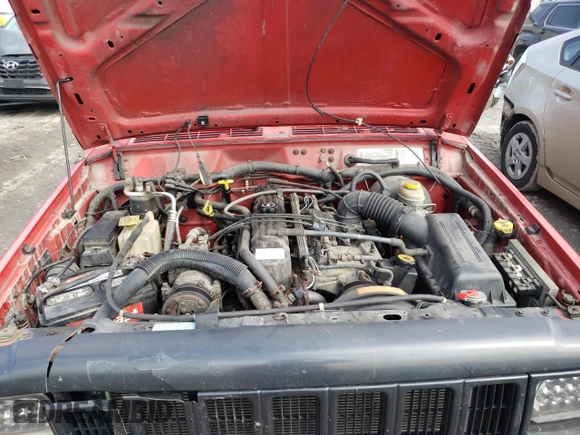 1998 Jeep Cherokee Sport with VIN 1J4FJ68S5WL107496, listed as a Copart auction lot 74401404 with 225,257 mi miles and Salvage Title. Bid and sale history available at carsss.com. Image 12.