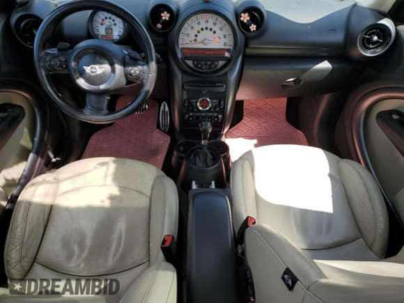 2013 MINI Countryman S ALL4 z VIN WMWZC5C56DWP33270, wystawiony jako Copart lot #56804085 z przebiegiem 141 637 mil mil oraz Szkoda całkowita • Salvage title. Historia ofert i sprzedaży dostępna na DreamBid. Obrazek 8.