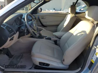 2010 BMW 1 Series 128i with VIN WBAUL7C57AVJ77350, listed as a Copart auction lot 43150295 with 240,639 mi miles and Clean title. Bid and sale history available at DreamBid. Image 7.
