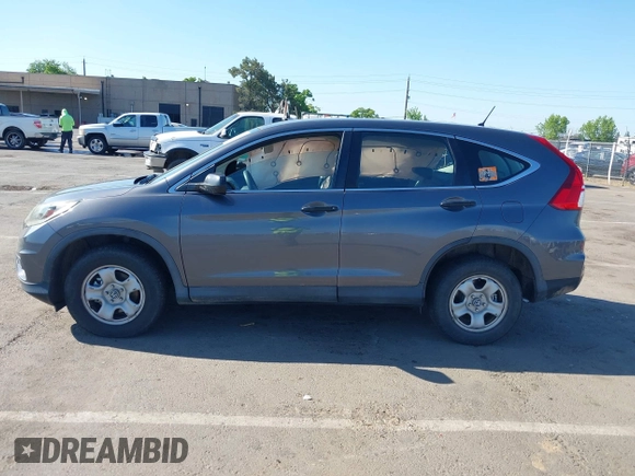 2015 Honda CR-V LX with VIN 3CZRM3H31FG709059, listed as a IAAI auction lot 42131551 with 98,738 mi miles and . Bid and sale history available at carsss.com. Image 14.
