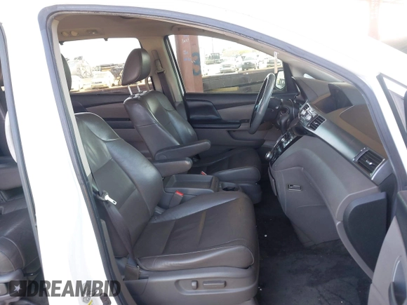 2012 Honda Odyssey EX-L with VIN 5FNRL5H67CB051764, listed as a IAAI auction lot 42493181 with 167,189 mi miles and . Bid and sale history available at DreamBid. Image 5.