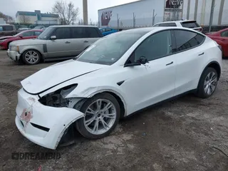2022 Tesla Model Y Long Range with VIN 7SAYGAEE4NF516625, listed as a IAAI auction lot 41892225 with 33,054 mi miles and . Bid and sale history available at DreamBid. Image 17.
