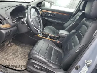 2020 Honda CR-V Touring z VIN 2HKRW2H9XLH236764, wystawiony jako Copart lot #59693475 z przebiegiem Nie podano mil oraz Czysty tytuł • Clean title. Historia ofert i sprzedaży dostępna na DreamBid. Obrazek 7.