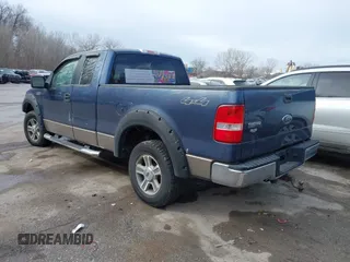 2005 Ford F-150 XLT with VIN 1FTPX14555FA52444, listed as a IAAI auction lot 41604545 with 209,297 mi miles. Bid and sale history available at carsss.com. Image 3.