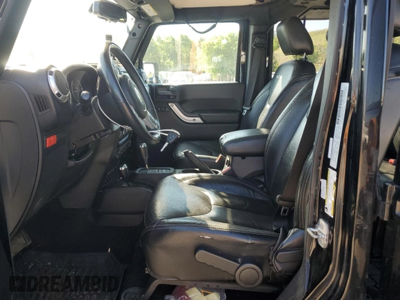 2016 Jeep Wrangler Unlimited Rubicon with VIN 1C4HJWFG3GL155092, listed as a Copart auction lot 62410365 with 82,231 mi miles and Salvage title. Bid and sale history available at DreamBid. Image 7.