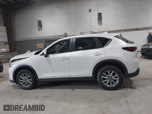 2023 Mazda CX-5 2.5 S with VIN JM3KFBAMXP0153362, listed as a IAAI auction lot 41875188 with 57,648 mi miles. Bid and sale history available at carsss.com. Image 14.
